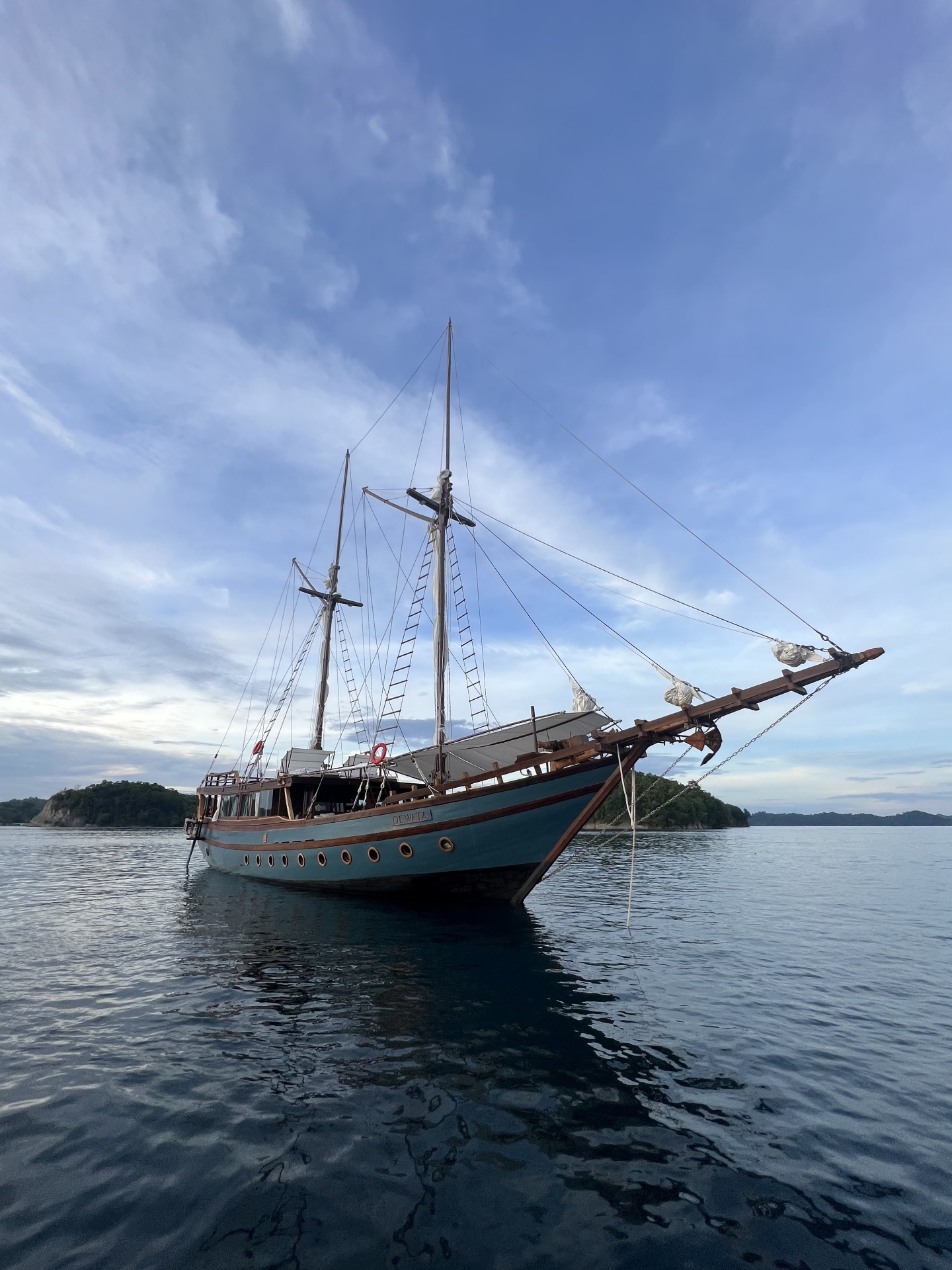 Phinisi yacht at sunset in Raja Ampat