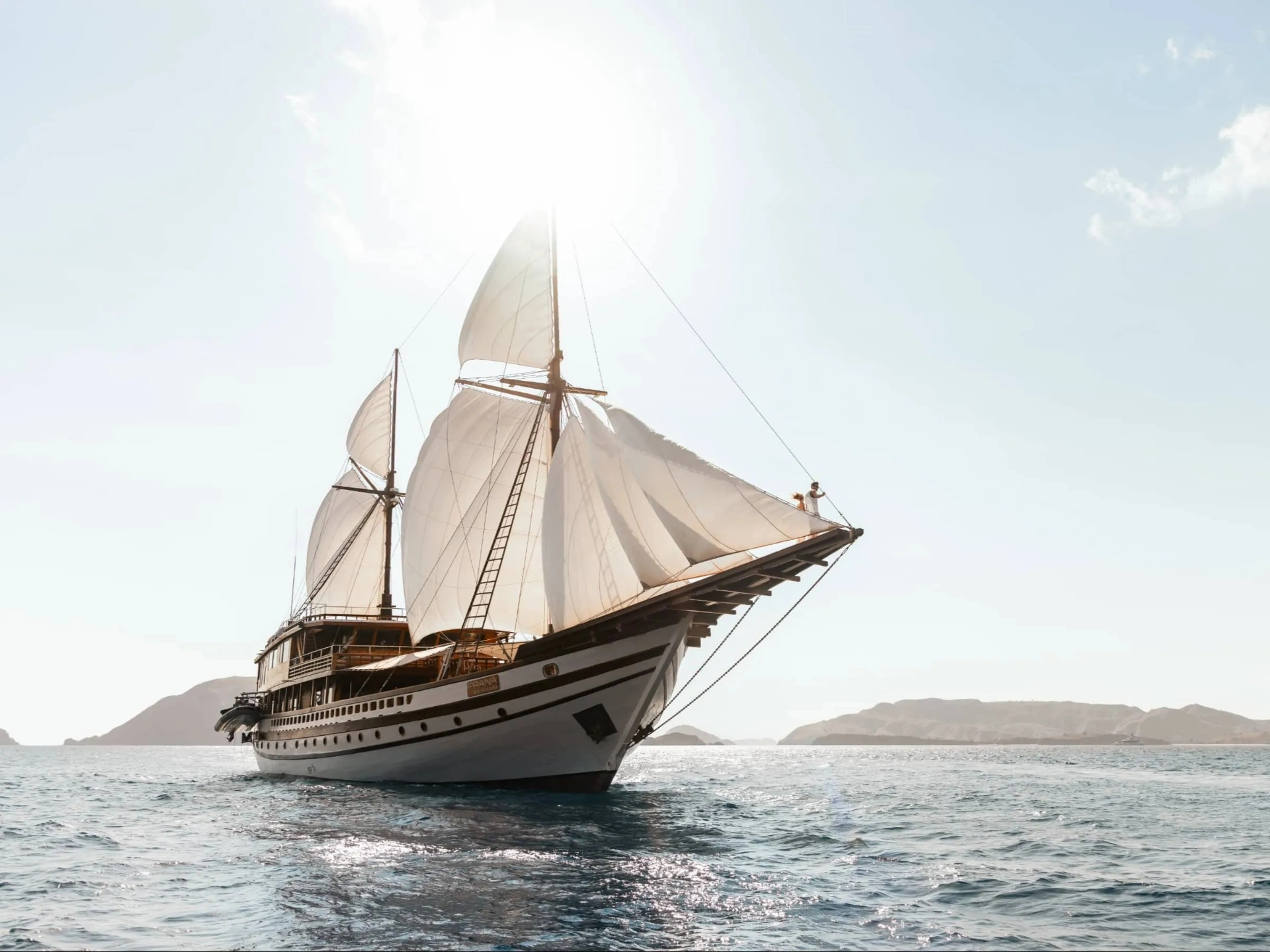 Prana by Atzaró luxury phinisi under full sail in Indonesia — Raja Ampat private yacht charter