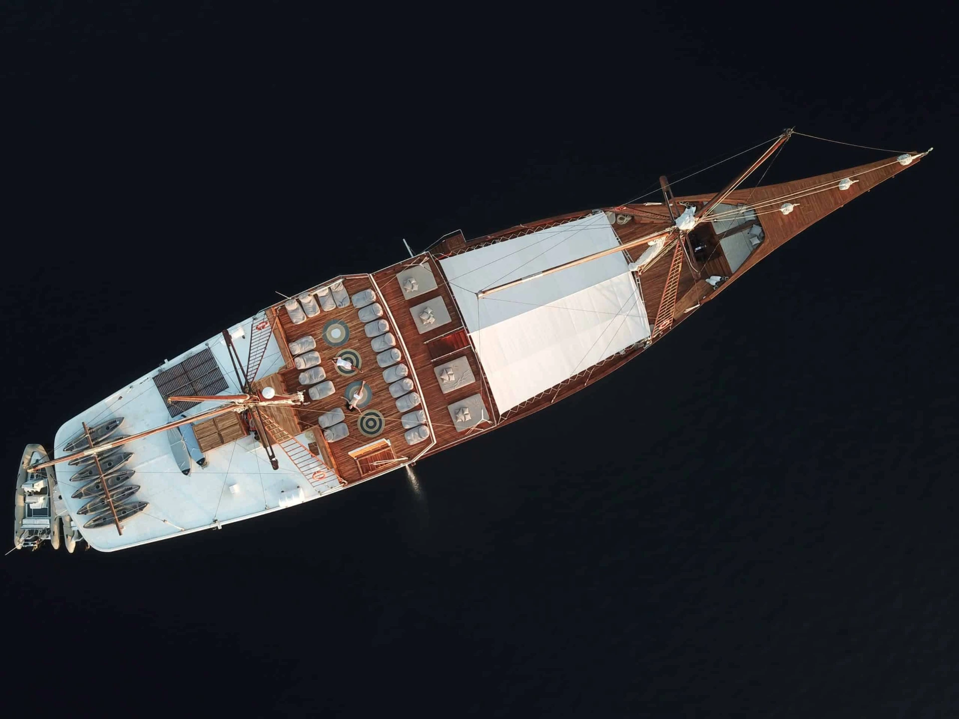 Aerial top-down view of Prana by Atzaró showing sundeck, kayaks and tender